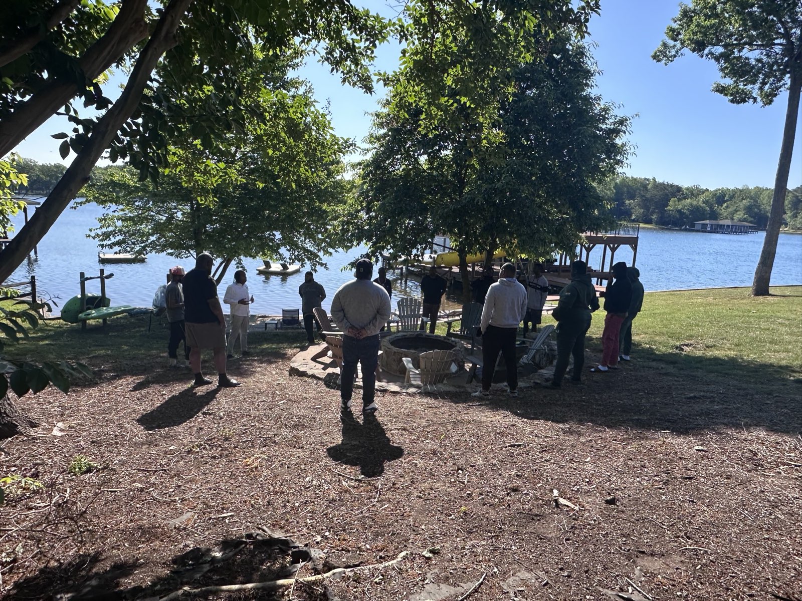 Athari Fellows outdoors by the lake at the retreat