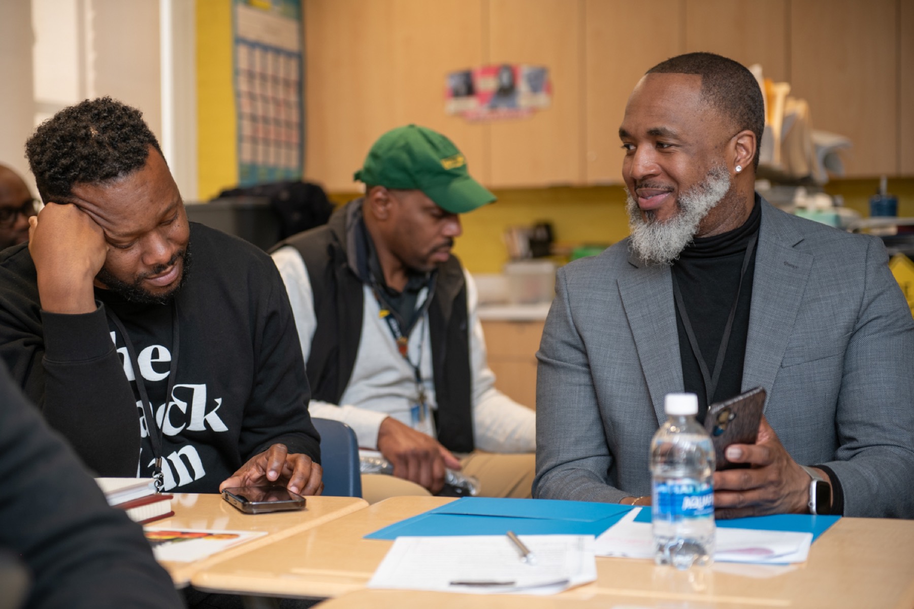 Black male educators in conversation during a NABME session