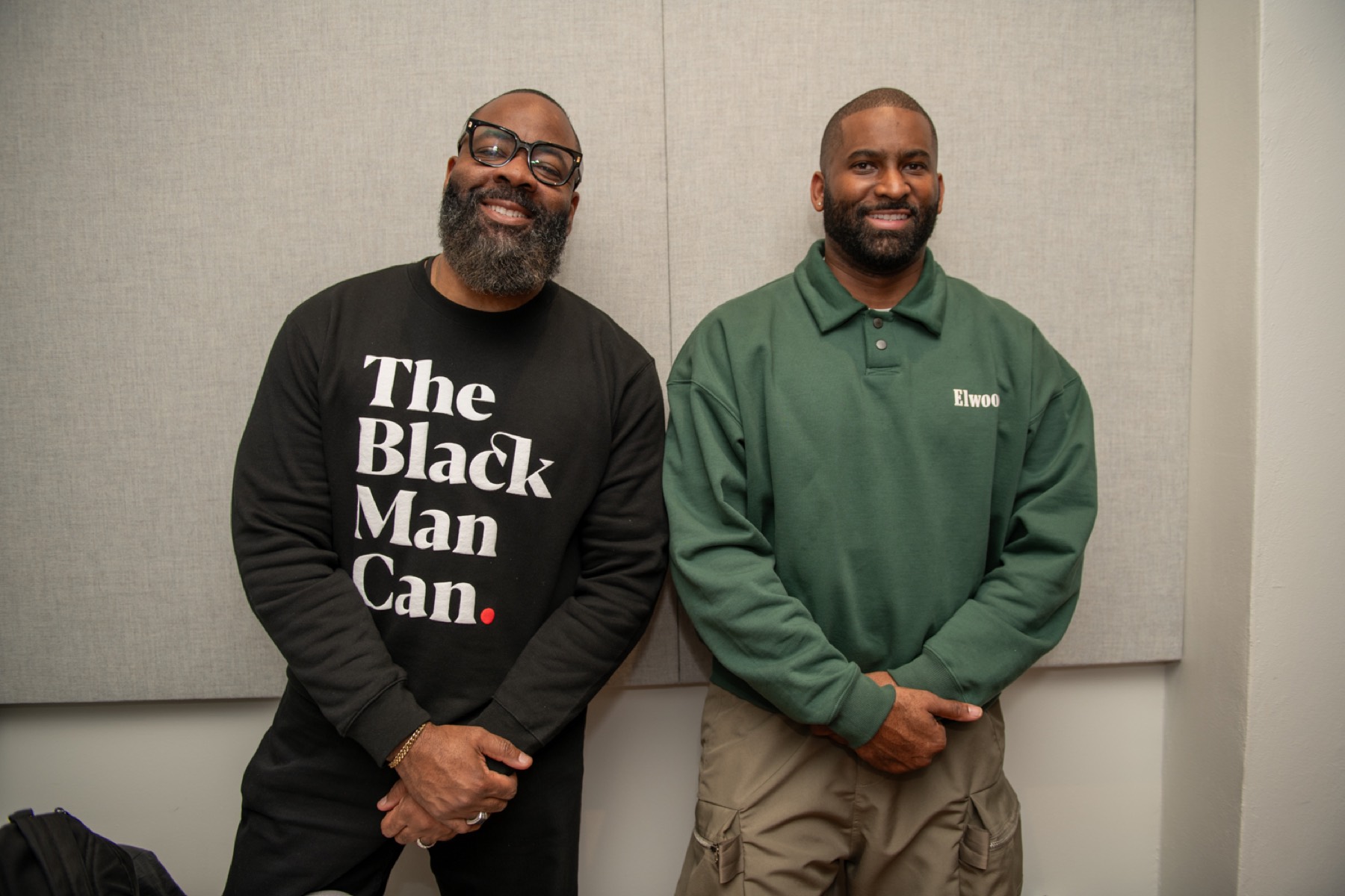 Two educators smiling side by side